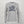 Gray long-sleeve shirt with 'Go Outside Minnesota' graphic on a white brick wall.